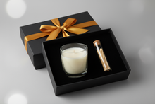 Load image into Gallery viewer, black gift box with mustard yellow ribbon. The candle does not have a label.  Inside the box is a clear transparent glass candle and a glass tube of matches.  
